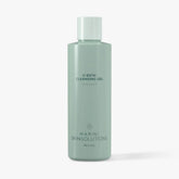 green bottle of skincare that says c-esta cleaning gel